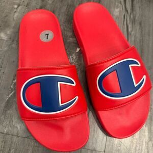 Men’s champion slides. Red and blue, size 7. Gently worn.